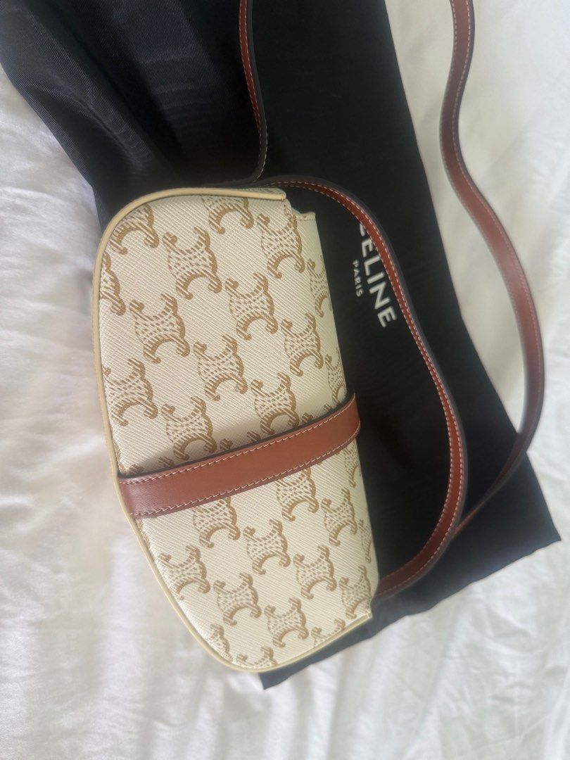 Celine Tabou clutch on strap White (Category: Bags & Wallets) located in Singapore. Submitted by sunsets.sunrise (Listing ID 1351975277, Image 2). Description: Letting go my Celine Tabou cause seldom use Market price 2100$ With dustbag and paperbag Celine don’t come with box anymore Receipt date 2023 .