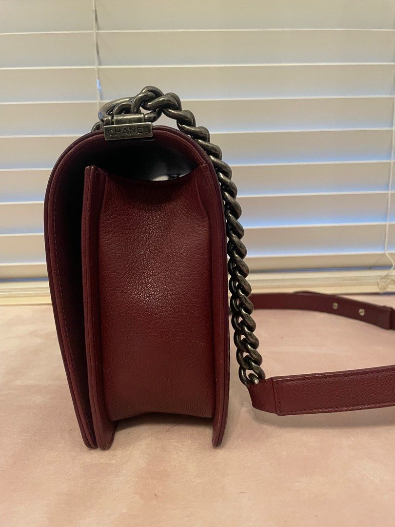Chanel Boy New Medium in burgundy (Category: Bags & Wallets) located in Singapore. Submitted by firsttimemom.decluttering (Listing ID 1352008413, Image 3). Description: Chanel Boy New Medium in Burgundy Full set comes w/ Authenticity card No scuffing Bought in Year 2016 Measurements: 28 x 17 x 7 cm Fast and hassle-free deal, no low ballers! Thank you! For sincere buyers 🙏🏻.
