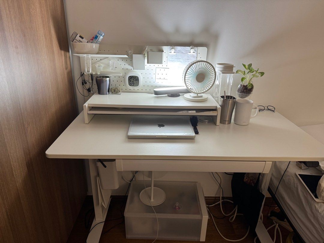 Desktop Riser (Category: Other Home Furniture) located in Singapore. Submitted by universalstudiosingapore (Listing ID 1352102370, Image 2). Description: Desktop riser. Made of wood, quite heavy. Able to help increase desktop space by quite a bit. Could also act as a book holder. Changed to a smaller table and it doesn’t fit anymore.