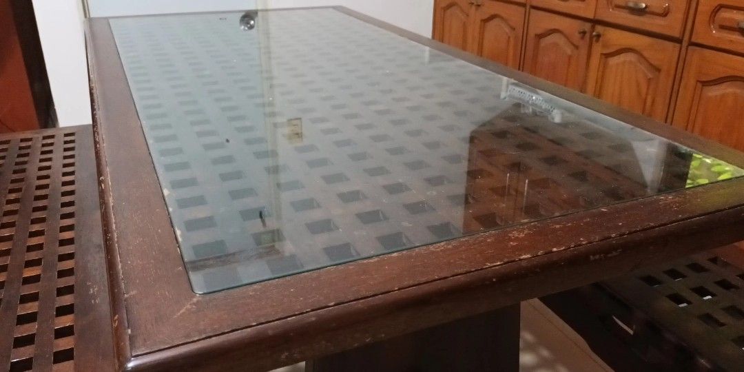 dining table and benches - all wood (Category: Tables & Sets) located in Las Pinas. Submitted by tonygaticales (Listing ID 1351977440, Image 3). Description: 6 seating capacity dining table and 2 benches. solid wood with glass top. very durable and stable( used for a long time). easy to assemble and disassemble(just insert the wood lock). length 59 inches, width 29 inches, height 30 inches. honest issue: some scratches on glass, and scratches on 