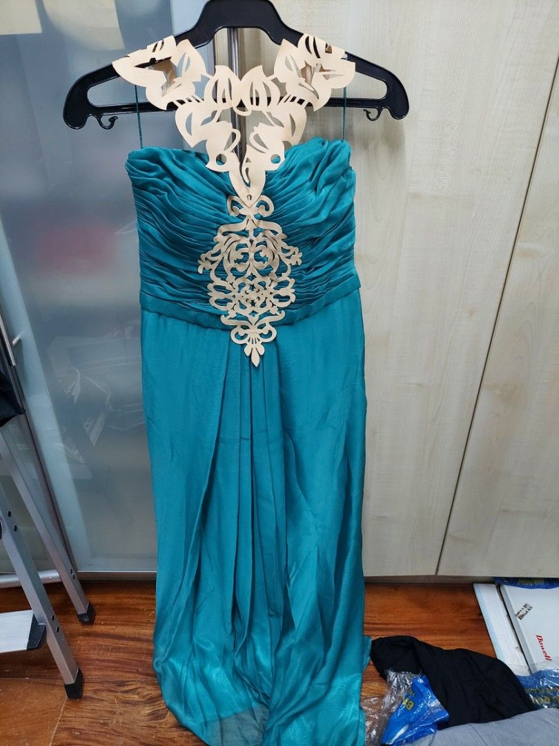 Evening gown size M (Category: Evening dresses & gowns) located in Manila. Submitted by mommiedeclutter (Listing ID 1352063437, Image 1). Description: Evening gown size M worn as bridemaid once nicely made. very flattering with bones made by Camille Co rfs: decluttering.