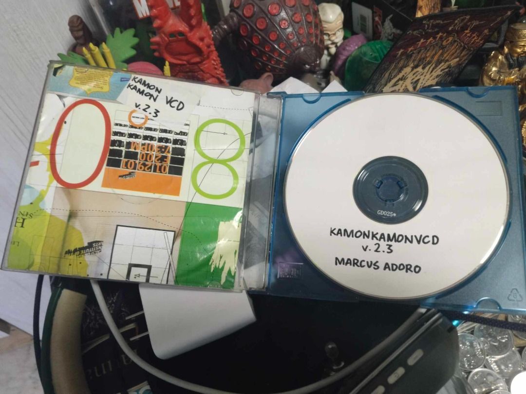 KAMON KAMON VCD V2.3 Marcus Adoro Eraserheads (Category: CDs & DVDs) located in Quezon City. Submitted by dixiewhiskey (Listing ID 1351978465, Image 2). Description: KAMON KAMON VCD V 2.3 is the experimental audiovisual project of Marcus Adoro of Eraserheads. Rare experimental VCD, Near mint condition no issues, no pen marks .