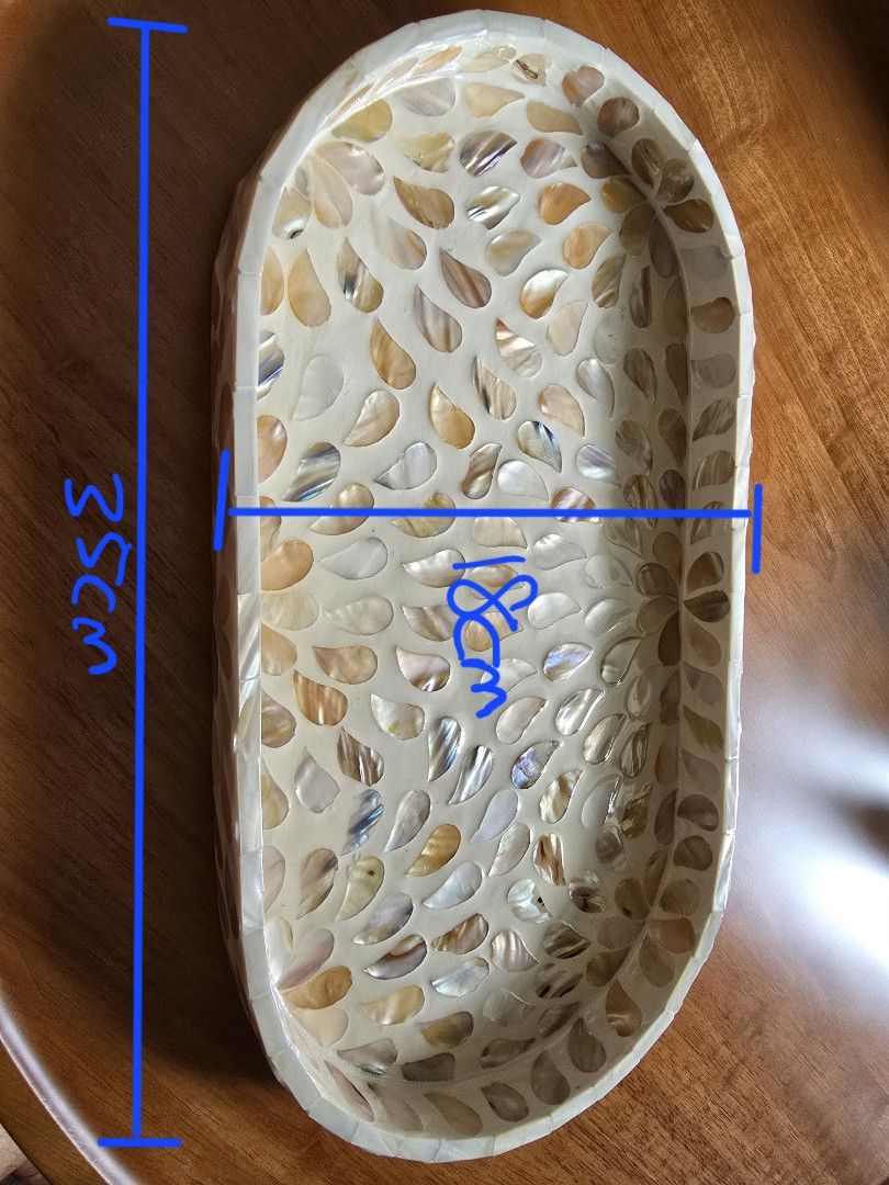 Multifunction Serving Tray (Category: Other Home Decor) located in Singapore. Submitted by isaac.l (Listing ID 1352055550, Image 2). Description: ✨ Elegant Capiz Shell Tray – A Luxurious Touch for Your Home! ✨ ⭐ Exquisite Design: Beautifully inlaid with shimmering capiz shells, adding a touch of elegance and sophistication. ⭐ Originally SGD 189 from Takashimaya – Now a steal at just SGD 60 for this factory piece! ⭐ Perfect Size: 35cm x 18cm x 3cm