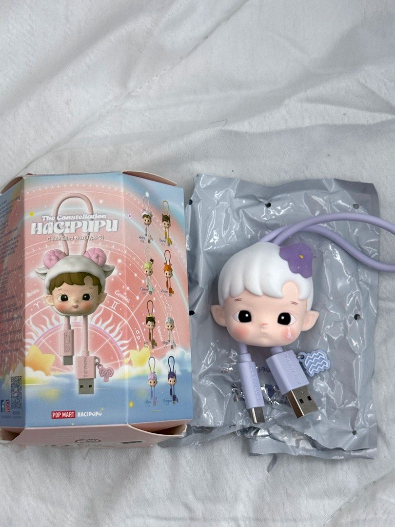 Popmart Hacipupu Constellation Charging Cable Type-C - Aquarius (Category: Chargers & Cables) located in Manila. Submitted by lennortfinds (Listing ID 1352060065, Image 1). Description: *Not for trade* Open box and foil to check design Never used and in pristine condition MOP: PAYO via GCash/Maya/BPI #sellpopmart #hacipupu .