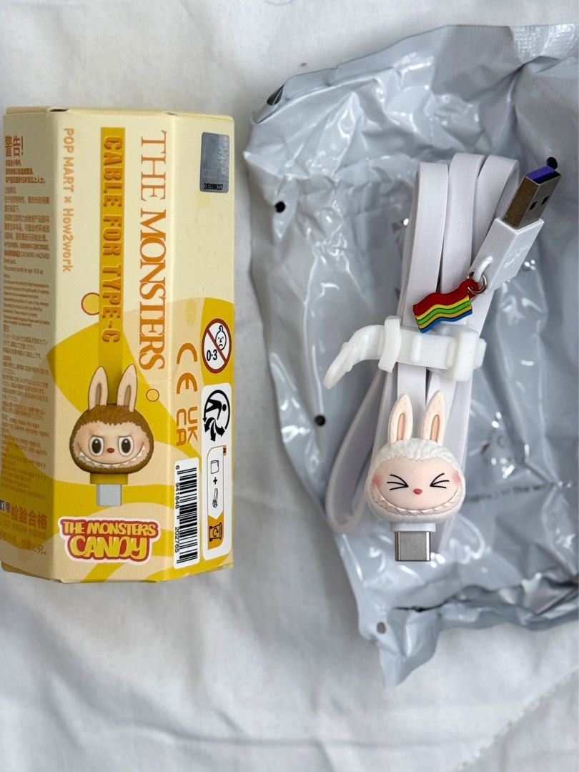 Popmart The Monsters Candy Charging Cable Type-C - Pearl White (Category: Chargers & Cables) located in Manila. Submitted by lennortfinds (Listing ID 1352060540, Image 1). Description: *Not for trade* Open box and foil to check design Never used and in pristine condition MOP: PAYO via GCash/Maya/BPI #sellpopmart .