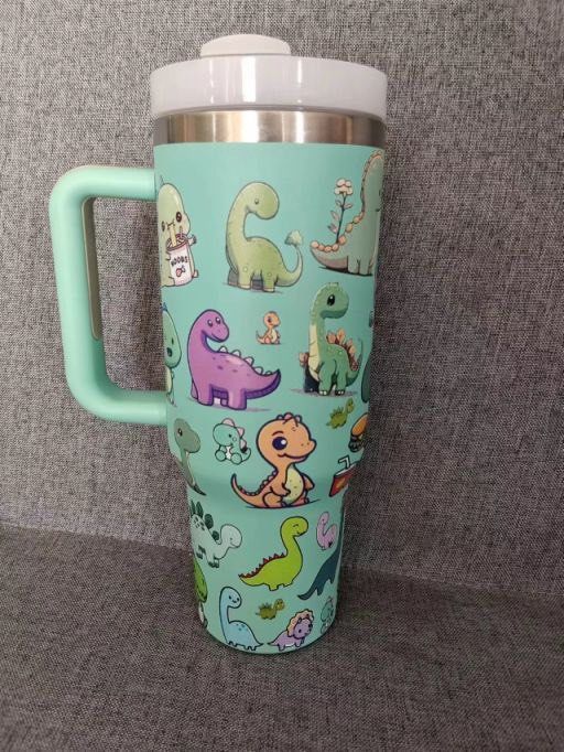 [SG Local Design] Dino Stanley Tumbler 2025. Dinosaur tumble design. Cute Dino pictures. (Category: Water Bottles & Tumblers) located in Singapore. Submitted by dominic.pereira. (Listing ID 1352029459, Image 3). Description: [SG Local Design] Dino Stanley Tumbler 2025. Dinosaur tumble design. Cute Dino pictures. https://sg.shp.ee/5p1usTy .