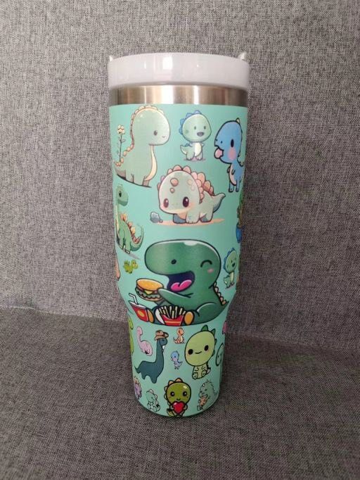 [SG Local Design] Dino Stanley Tumbler 2025. Dinosaur tumble design. Cute Dino pictures. (Category: Water Bottles & Tumblers) located in Singapore. Submitted by dominic.pereira. (Listing ID 1352029459, Image 1). Description: [SG Local Design] Dino Stanley Tumbler 2025. Dinosaur tumble design. Cute Dino pictures. https://sg.shp.ee/5p1usTy .