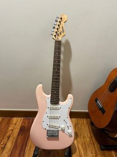 Squier by Fender Mini Pink Stratocaster electric guitar