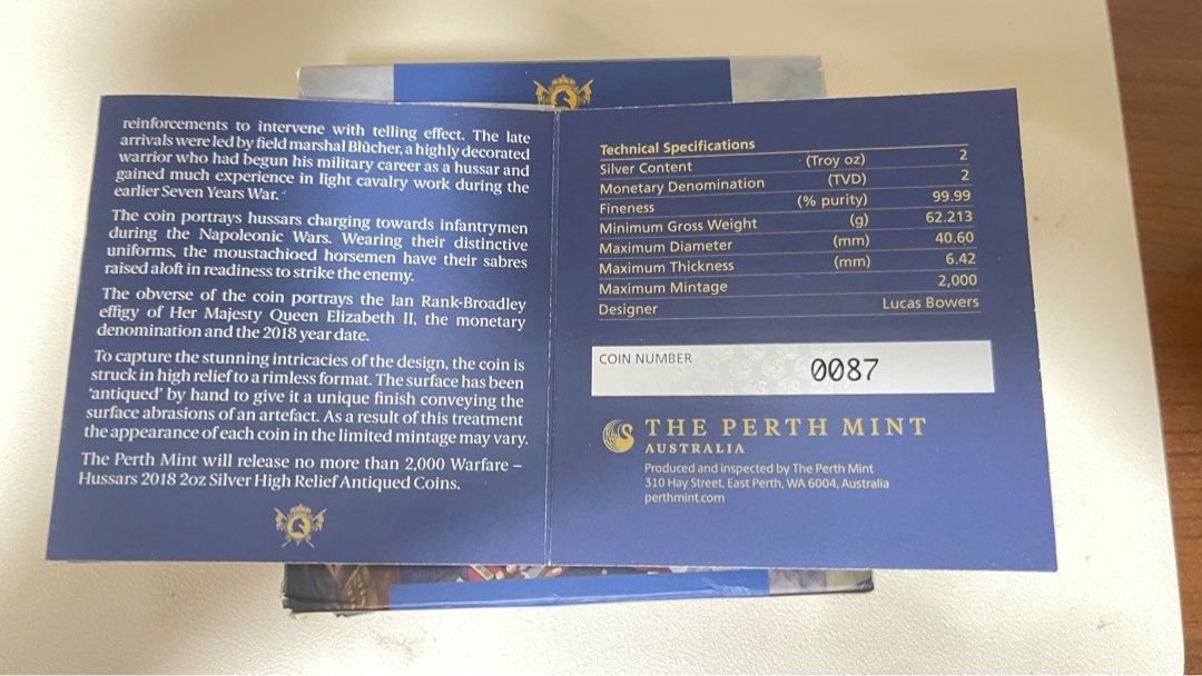 The Perth Mint Warfare Silver Coin (Category: Currency) located in Quezon City. Submitted by loisranulf02 (Listing ID 1351970235, Image 2). Description: The Perth Mint Warfare Silver Hussars 2 Troy Oz Antiqued High Relief Finish Limited Mintage No. 0087 of 2000 .