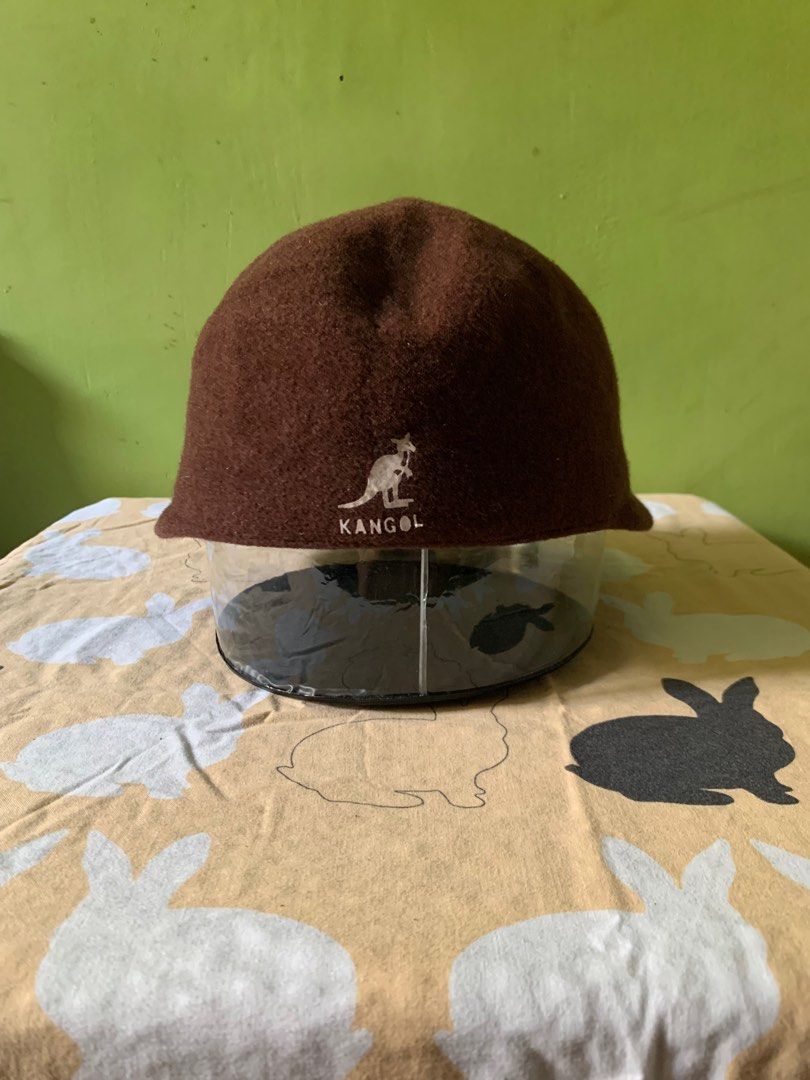 Vintage 1990s Kangol big brim cap (Category: Caps & Hats) located in Cagayan de Oro. Submitted by premium_thrifts (Listing ID 1352082433, Image 2). Description: Brown colorway Good condition Fits size Small - Medium head Issue: brim creasing Add shipping fee (via JRS or J&T).