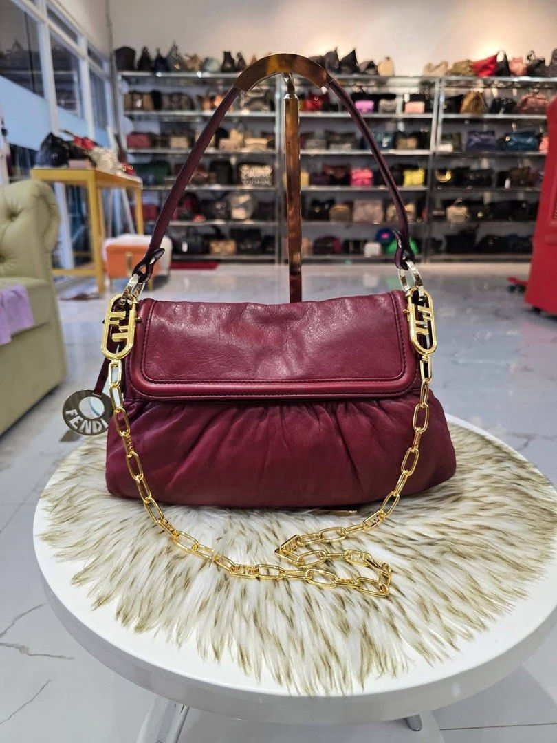 Authentic Fendi Zucca Chef Hobo Bag (Category: Luxury Bags & Wallets) located in Quezon City. Submitted by jhaediah (Listing ID 1355739025, Image 1). Description: - Authentic 💯 - Fendi Zucca Chef Hobo Bag - Small size - With free gold chain sling .