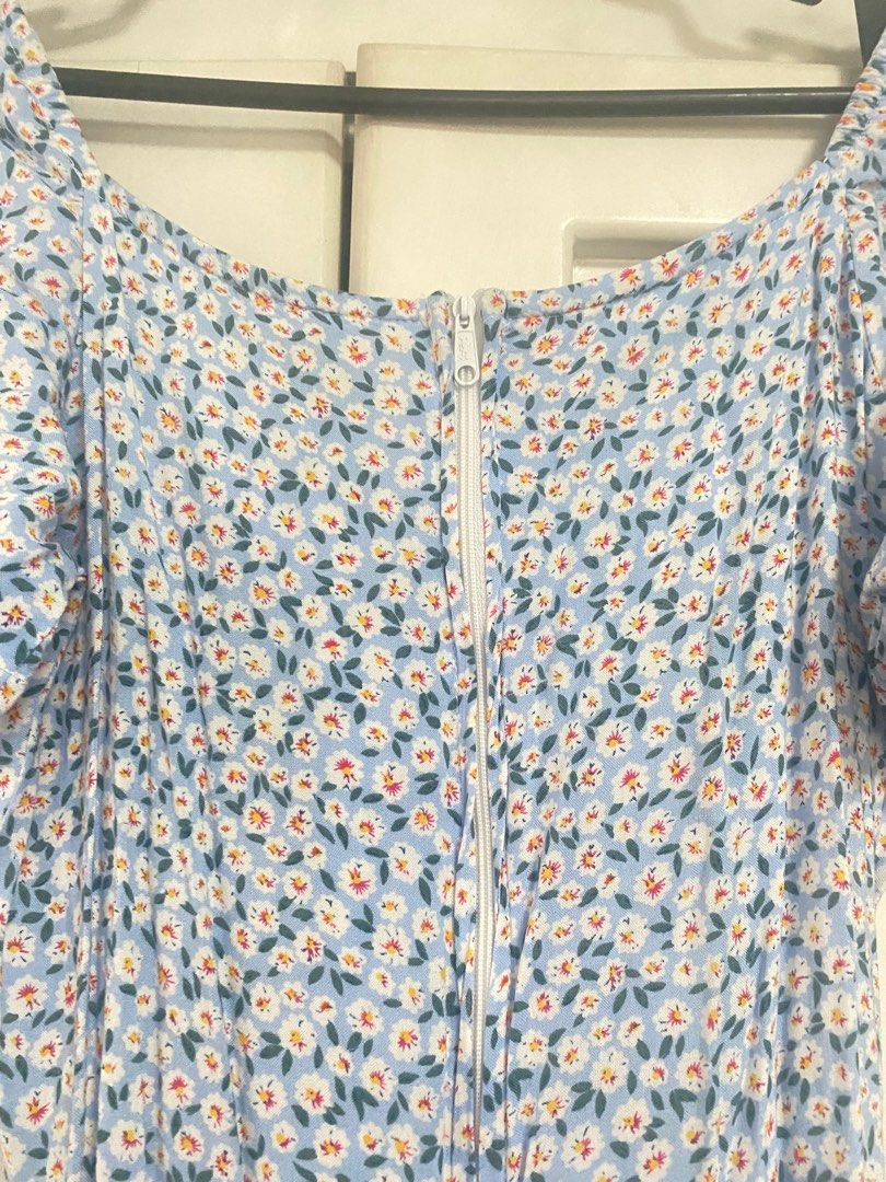 Blue Floral Slit Midi Dress (Category: Dresses) located in Quezon City. Submitted by wardrobelele (Listing ID 1355785376, Image 3). Description: - super cute and has pockets! - best fits S - rfs: decluttering.