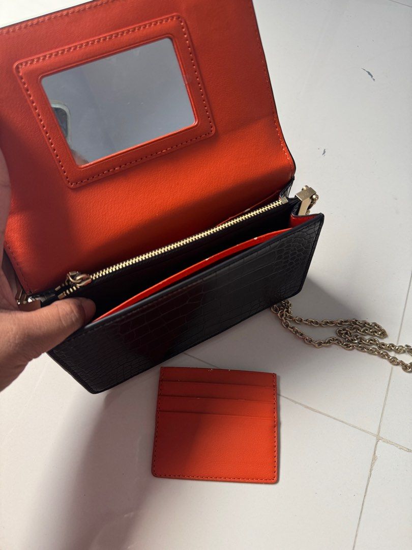 Charles & Keith Black Bag (Category: Clutches) located in Davao. Submitted by Chelly (Listing ID 1355651987, Image 3). Description: ✨Slightly used ✨With Dust Bag ✨Nakatago na lang kaya may slight pag balat sa loob bg bag (as seen on the photos) .