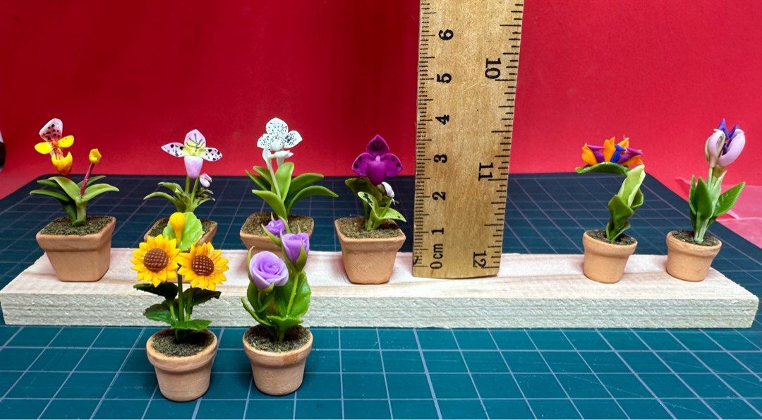 Handmade Miniature Flower Plant on pot, clay, 1 pc (Category: Handmade Craft) located in Singapore. Submitted by mini.collectibles.1 (Listing ID 1355712012, Image 2). Description: Handmade Miniature Flower Plant on pot, clay, 1 pc Random flower pot will be picked by seller Made from air dry clay There may be some finger pressing stains or prints due to handmade. Miniature Showcase Display Store at the address below: Blk 2019 Bukit Batok St 23 (In