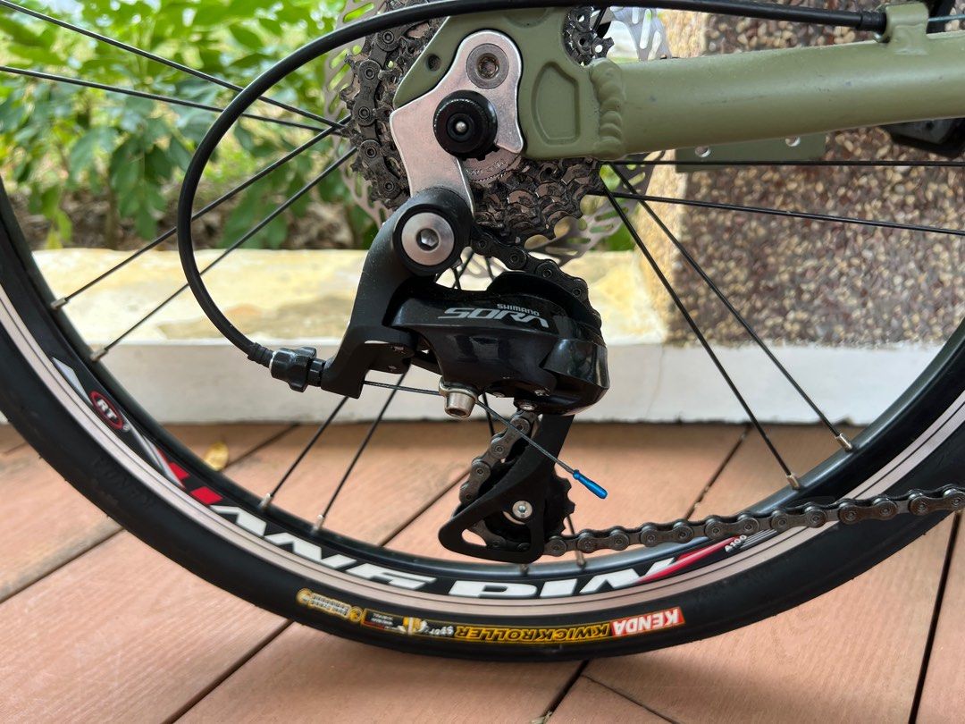 Java Zelo Foldable Bicycle (Category: Bicycles) located in Singapore. Submitted by seeheong (Listing ID 1355710065, Image 9). Description: Java Zelo 2 Foldable bike. Fully modded. 1. Shimano Sora 9 Speed Shifter 2. Shimano Sora derailleur 3. Litepro 56T chain ring 4. Litepro crank set 5. Tektro Xuriga Hydraulic brake set 6. Litepro Carbon Handlebar 7. Litepro seat post 8. Ruituo RT 451 20” wheel set 9. Kenda Kwick Roller Tyres 10. Others #foldabl
