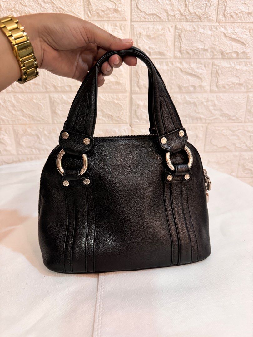 MCM Small Handbag Genuine Leather (Category: Luxury Bags & Wallets) located in Davao. Submitted by stellietas (Listing ID 1355639463, Image 3). Description: Size: Excelent condition, no flaws. Genuine Leather Small Black Silver tone hardware Clean interior.