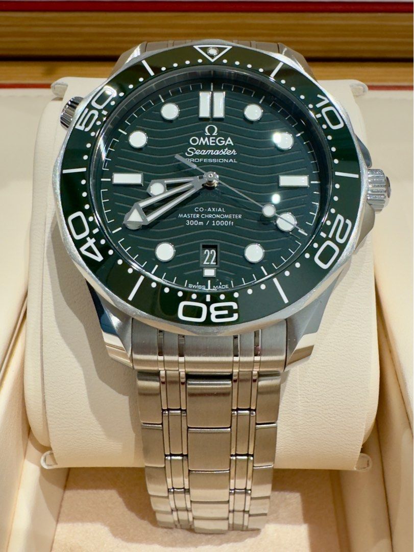Brand new 2022 Omega Seamaster (Category: Men's Watches) located in Del Monte. Submitted by richard.o.yu (Listing ID 1232997655, Image 1). Description: For sale or trade: Brand new Omega Seamaster diver 300m full set. 📌 42mm. Ceramic bezel. Green dial. Steel bracelet. 📌 Reference # 21030422010.001. 📌 Bnew. Complete set. Sep 2022 purchased foreign ad. Actual photos posted. Accepts trade in. PM for serious buyers. Thank you..