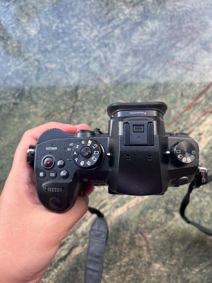 Panasonic Lumix GH5 Mirrorless MFT/M43 Camera (Category: Cameras) located in Paranaque City. Submitted by wynnnnnnn (Listing ID 1355764624, Image 2). Description: Panasonic Lumix GH5 Mirrorless MFT/M43 Camera Condition: 9/10 Issue: natanggal on off button (still usable, common issue) Inclusions: charger battery strap Asking price: 40k Other lenses for sale: 7artisans 7.5 f2.8 ii Fisheye Rokinon 7.5 f3.5 Fisheye Panasonic Leica 12-60 f2.8-4 Panaso