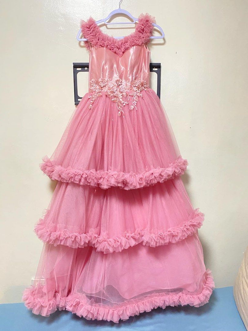 Pink Ball Gown (Category: Evening dresses & gowns) located in Manila. Submitted by bebeella (Listing ID 1355797491, Image 1). Description: Layered tulle gown with delicate flower details and ruffle accents. Perfect for JS Prom, debuts of formal occasions. Worn only and in excellent condition..