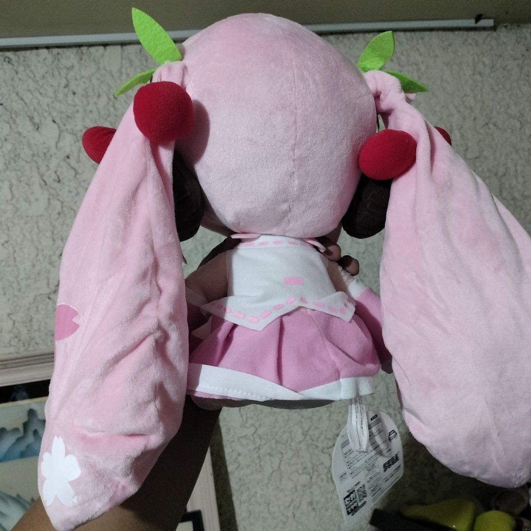 SEGA Sakura Hatsune Miku Plush (Category: Plushies & Soft Toys) located in Manila. Submitted by gorzuzofficial (Listing ID 1355828230, Image 3). Description: More or less 11" MOP: Gcash MOD: PBC/Lalamove/J&T.