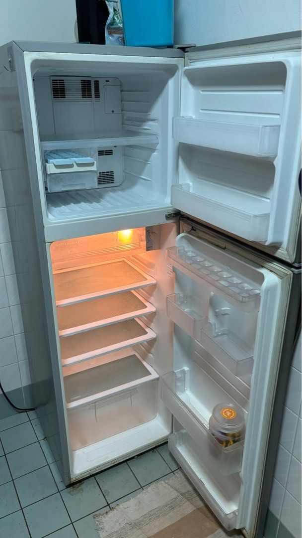 Sharp fridge (Category: Other Home Appliances) located in Petaling Jaya. Submitted by mabashop (Listing ID 1355003193, Image 2). Description: Sharp fridge for sale - works fine - sejuk mantap - nak pindah - done cleaning (refer picture) .