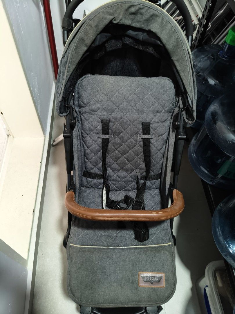 Stroller Keenz (Category: Strollers) located in Singapore. Submitted by abdulsaliman (Listing ID 1355672349, Image 3). Description: years old stroller, still good on the wheels and lock. bottom net able to house items with no damage, buckle intact. color fade, tear on sponge handle..