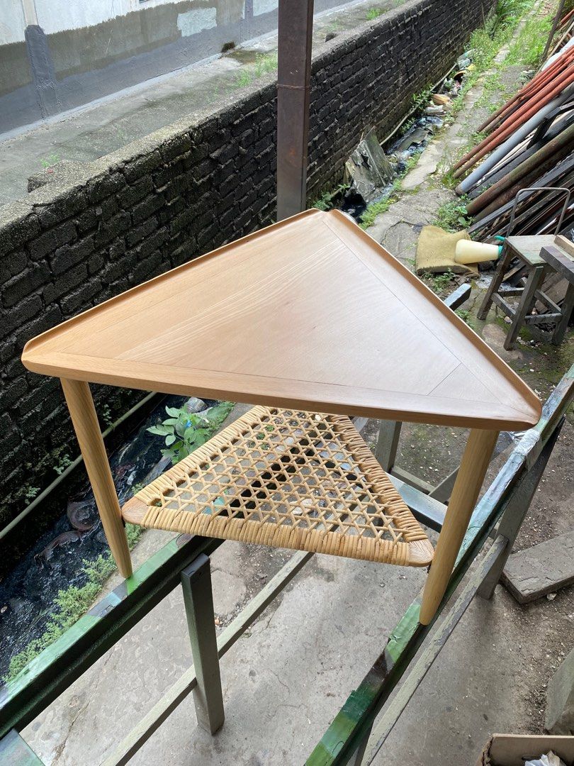 Triangle Side Table (Category: Tables & Sets) located in Kuala Lumpur. Submitted by soohaohao (Listing ID 1355816568, Image 2). Description: Type of wood : Top is Beech Wood , leg is Ash Wood . The second layer is woven from rattan. Size : 61x61x61cm x 49cm(Height) Price can slightly negotiate KL area free delivery (8.30pm to 10pm) Lalamove or self collect available .