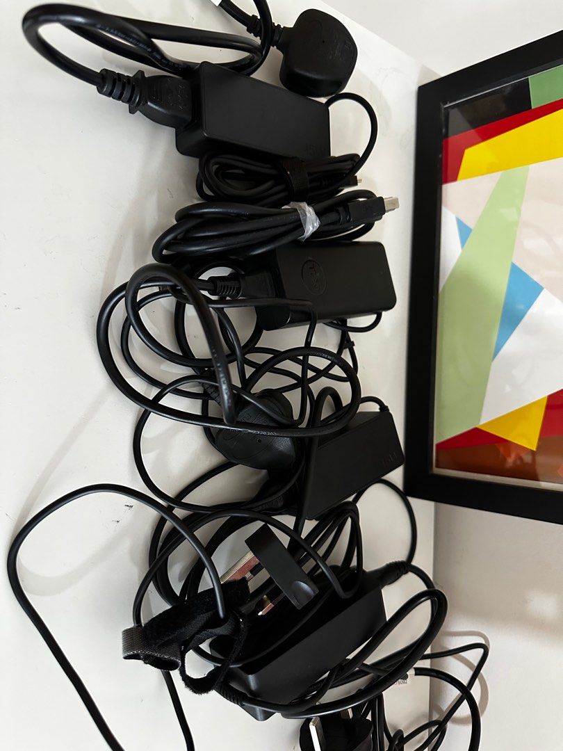 Assorted laptop chargers406115483397672960