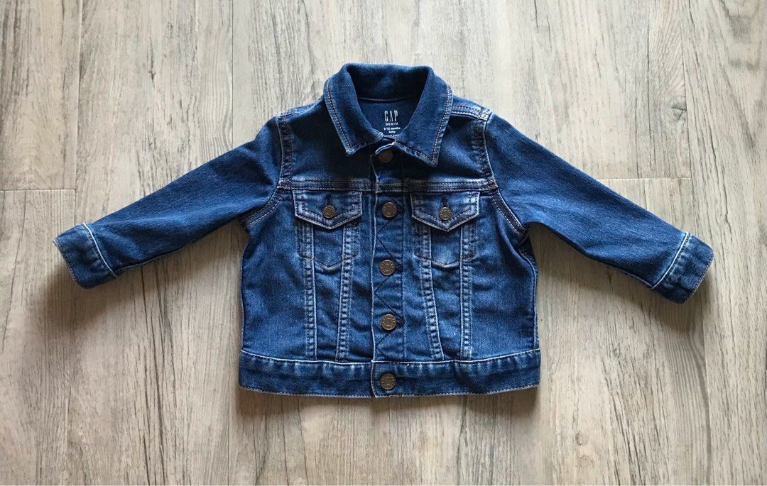Baby Gap unisex Denim Jacket (Category: Babies & Kids Fashion) located in Paranaque City. Submitted by famsale2016 (Listing ID 1357478292, Image 1). Description: Unisex Denim jacket. Like new condition. Worn not more than 3 times. Soft fabric. Comfy to wear. 6-12months on tag but can fit up to 18months.