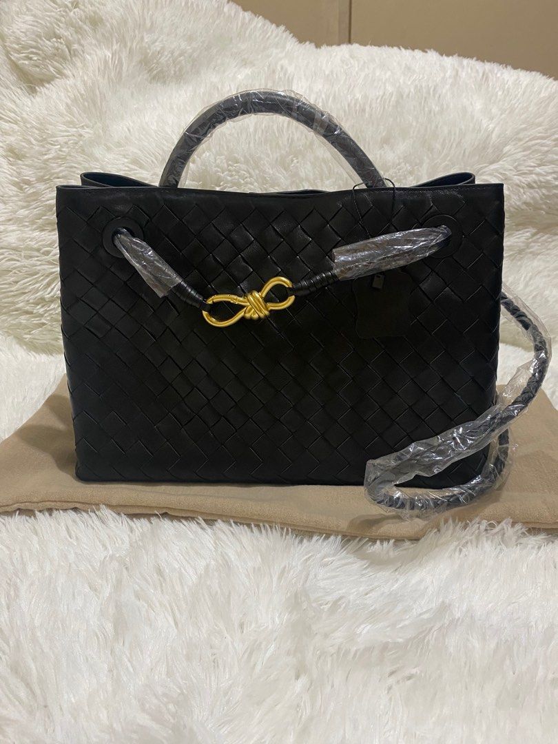 BV Andiamo Medium Black (Category: Luxury Bags & Wallets) located in Makati City. Submitted by secondlyf (Listing ID 1357504668, Image 1). Description: BV Andiamo – Medium (Black) ✨ Crafted from genuine sheepskin leather with a luxurious matte gold hardware that’s both elegant and substantial. ✨ Hand-stitched intrecciato leather—a timeless, chic design perfect for work, daily errands, or casual outings. ✨ Versatile wear: Shoulder bag, crossbody, 