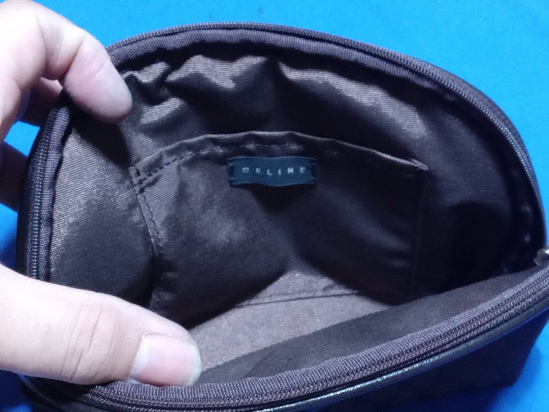 Celine pouch (Category: Luxury Bags & Wallets) located in Manila. Submitted by monchiing (Listing ID 1357430383, Image 2). Description: celine pouch nylon material 9 /10 condition dark brown color can fit phone and medium wallet.