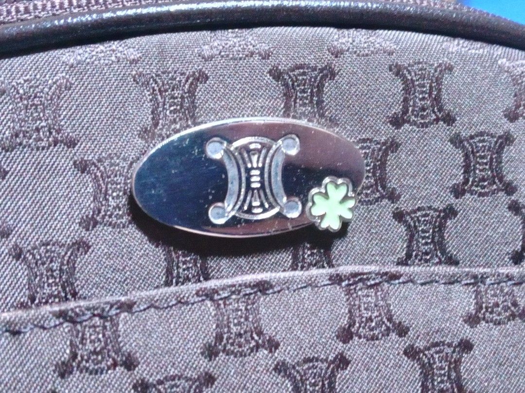 Celine pouch (Category: Luxury Bags & Wallets) located in Manila. Submitted by monchiing (Listing ID 1357430383, Image 3). Description: celine pouch nylon material 9 /10 condition dark brown color can fit phone and medium wallet.