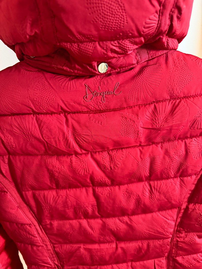 Desigual Padded Inga Winter Jacket (Category: Coats, Jackets and Outerwear) located in Taguig. Submitted by aa_decluttering (Listing ID 1357563069, Image 2). Description: Desigual women’s long padded coat Bought in Desigual boutique in Spain. Worn once only. Lightweight but warm, embossed fabric with signature Desigual details. With hood, zip pockets, and branded hardware. Excellent condition, like brand new. This coat is perfect for: • Spain / E