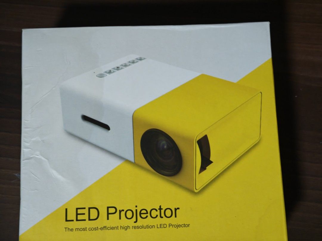 LED Projector (Category: Projectors) located in Singapore. Submitted by rclk11 (Listing ID 1357545331, Image 1). Description: Got as a free gift from buying mobile phone..