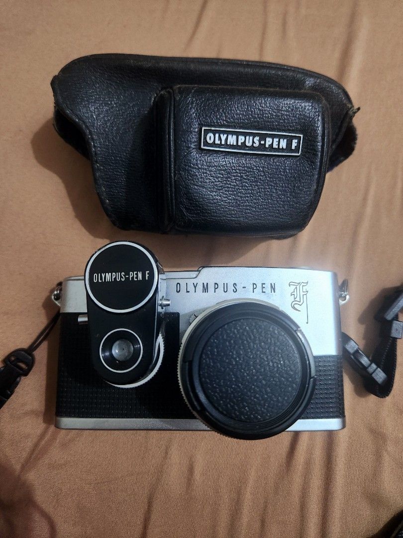 Olympus Pen Gothic with Olympus Pen accessories (Category: Cameras) located in Taguig. Submitted by 35mm.misu (Listing ID 1357550413, Image 2). Description: NO MEET UP AS I AM WORKING REMOTELY. LAST PRICE. AGAIN LAST PRICE. ALL PARTS WORKING PERFECTLY. The only thing noticeable is that it is of course years ago so some few age marks. NO HIDDEN ISSUES. No dents or unnecessary scratches on lens. Olympus Pen F Gothic with Zuiko lens, its original le