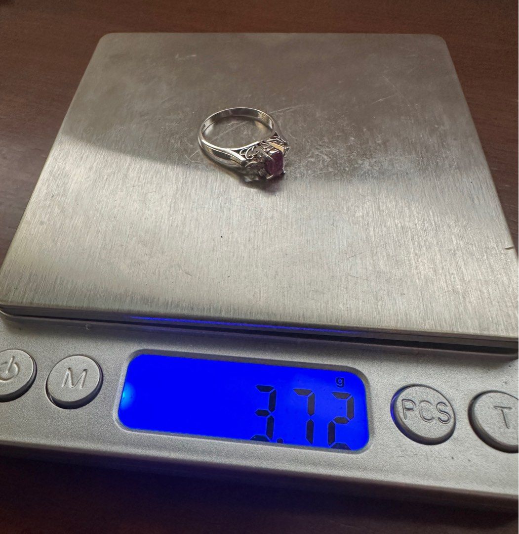 Ruby ring (Category: Rings) located in Singapore. Submitted by atnt2020 (Listing ID 1357478992, Image 4). Description: Bought in the 1980’s or 1990’sz Stored away; never used. Surrounded by small diamonds (carat size unavailable). Ruby carat approx 0.53. Ring material is platinum. Stone approx 0.5cm in length Size approx 5.8 (see photo). Weight approx 3.75g Meet-up: Clementi West St 2 or Clementi Mall or Clementi station .