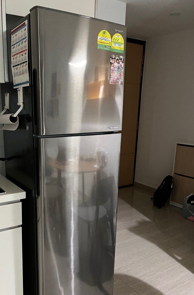 Sharp refrigerator (Category: Refrigerators & Freezers) located in Singapore. Submitted by monotours (Listing ID 1357532130, Image 1). Description: Used for barely three years. Quite a lot of life left.