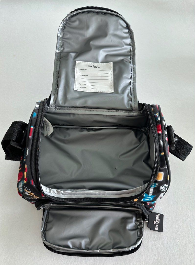 Smiggle Double Decker Lunch Bag w/ Strap (Category: Other Babies Going Out Needs) located in Manila. Submitted by monica515 (Listing ID 1357520405, Image 2). Description: Size: 6.5”h x 9”w x 6”d.