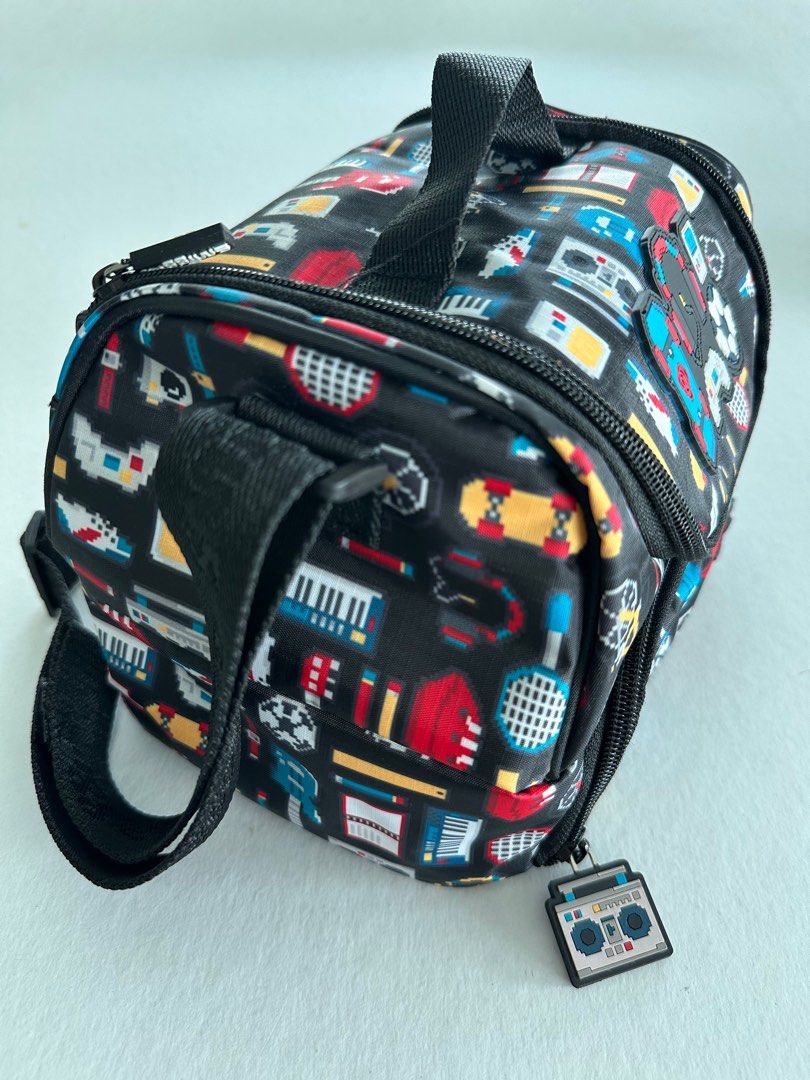 Smiggle Double Decker Lunch Bag w/ Strap (Category: Other Babies Going Out Needs) located in Manila. Submitted by monica515 (Listing ID 1357520405, Image 3). Description: Size: 6.5”h x 9”w x 6”d.