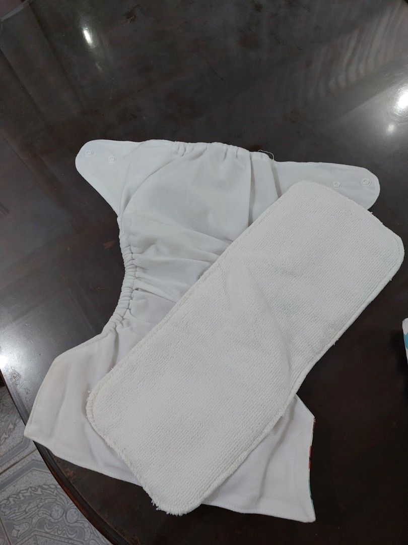 Washable diapers (Category: Other Baby Bathing & Changing Needs) located in Makati City. Submitted by monicaelise (Listing ID 1357542529, Image 2). Description: with inserts from hush hush babies never used only washed.