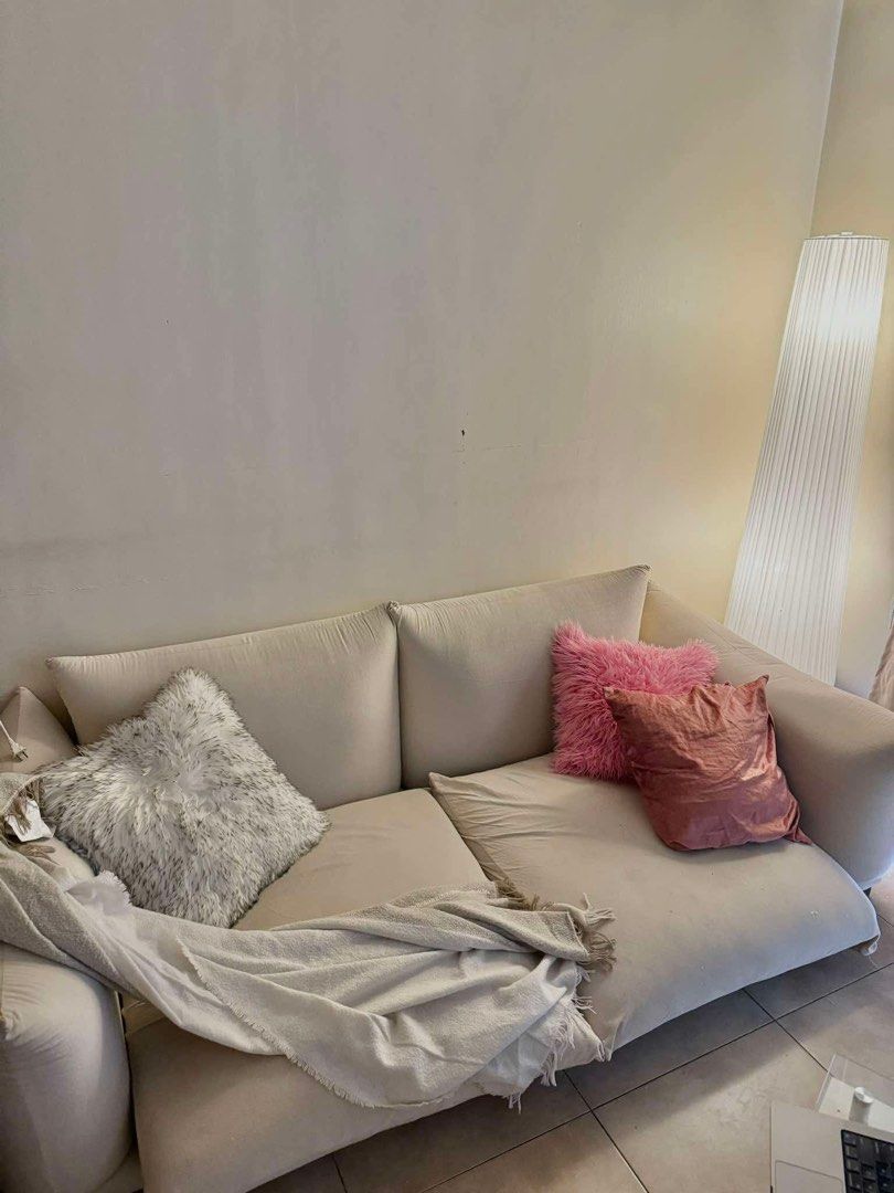3 seater sofa (Category: Sofas) located in Mandaluyong City. Submitted by TekiPH (Listing ID 1357768920, Image 2). Description: Spacious 3-seater sofa looking for a new home! ₱18,000. Off-White color ₱10,000 if pickup tonight or friday. From Undohome Furniture 79”L x 38”W x 26”H in inches. Perfect for a living room or family room. Some signs of use, but still very comfortable. DM for more photos and info. Shipping c/o buyer. Shipping from Sampalo