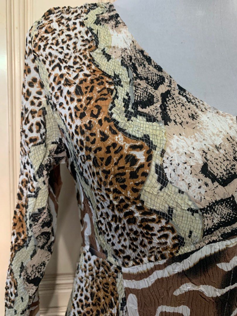 Animal Print Stretchable Dress (Category: Dresses) located in Quezon City. Submitted by FashionSense4Less (Listing ID 1357708530, Image 2). Description: Animal Print Stretchable Dress Very good condition/like new Slip on/Stretchable Fabric/no pocket/with lining Size: medium-large Bust: 38-44” ; Waist:34-40” ; Length: 47” Very nice in actual .