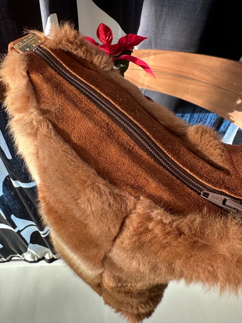 Australia Fur Bag (Category: Cross-body Bags) located in Bayan Lepas. Submitted by httpdons (Listing ID 1357593451, Image 3). Description: ✅ Bought it years back in Australia but haven’t put to a good use so it looks a little somber ✅ Zip still functional ✅ Selling to declutter.