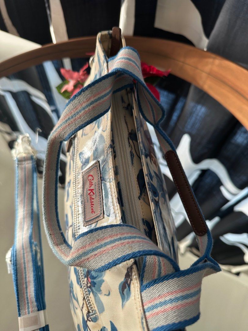 Cath Kidston Blue Floral Handbag (Category: Shoulder Bags) located in Bayan Lepas. Submitted by httpdons (Listing ID 1357593195, Image 3). Description: ✅ Bag is brand new but haven’t used for years so there might be some discolouration ✅ Selling to declutter ✅ Bought at Heathrow airport.