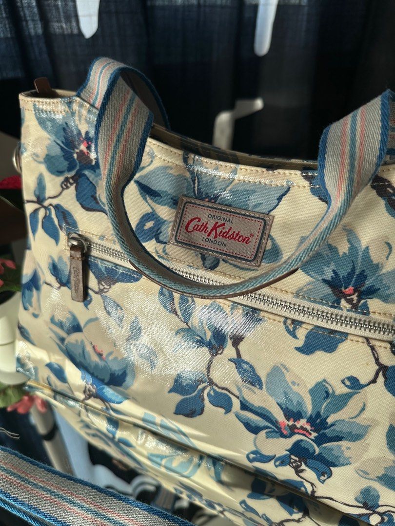 Cath Kidston Blue Floral Handbag (Category: Shoulder Bags) located in Bayan Lepas. Submitted by httpdons (Listing ID 1357593195, Image 2). Description: ✅ Bag is brand new but haven’t used for years so there might be some discolouration ✅ Selling to declutter ✅ Bought at Heathrow airport.