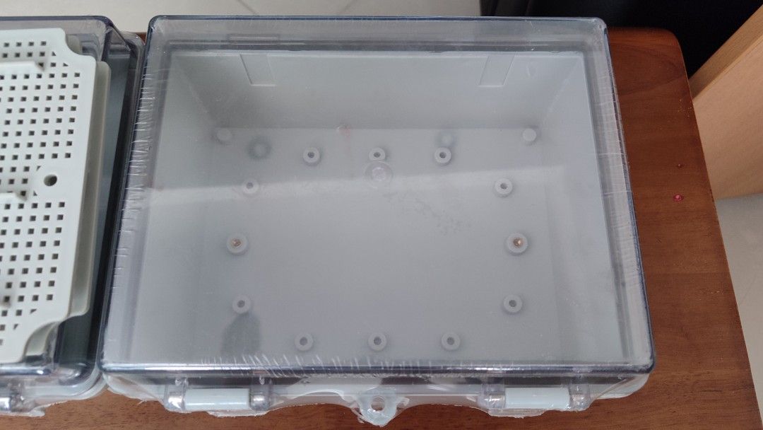 Control panel box (Category: Electrical, Adaptors & Sockets) located in Singapore. Submitted by iuwinwin (Listing ID 1357599870, Image 2). Description: I have 2 new white and transparent encloser for sales, $10 each , interested can pm. size: 23x18x11.5cm($10)- 2pcs 32x22x15.5cm (last picture $15) - 1pc.