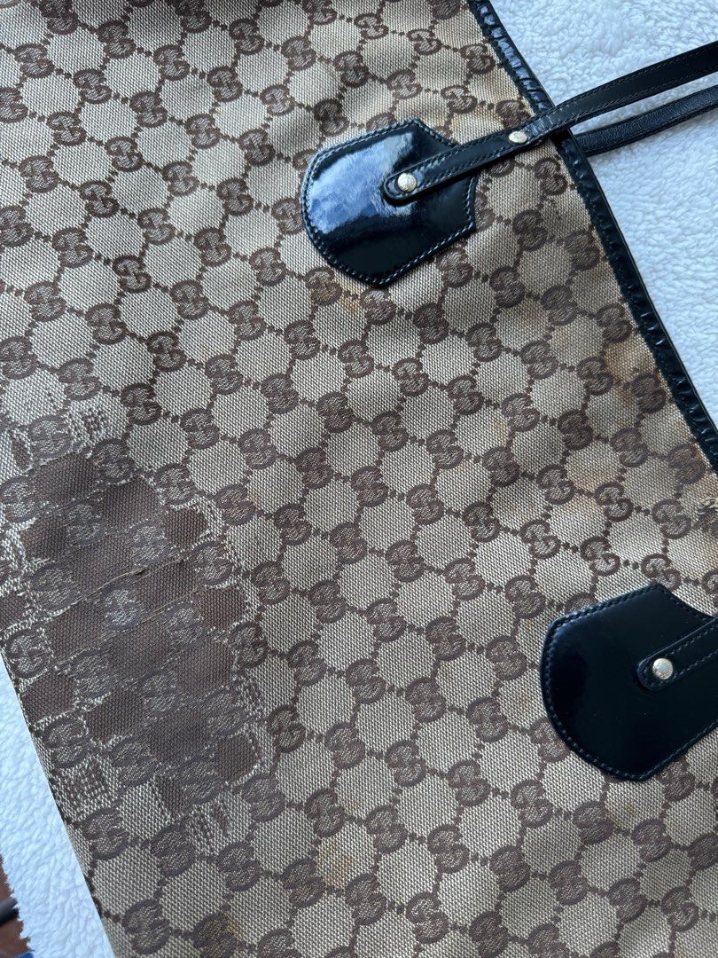 Gucci Tote Bag (Category: Luxury Bags & Wallets) located in Quezon City. Submitted by sunday_thrifts (Listing ID 1357675497, Image 2). Description: Original Gucci Tote Bag With Charm and dustbag Heavily used signs of wear and tear Bought in Singapore.