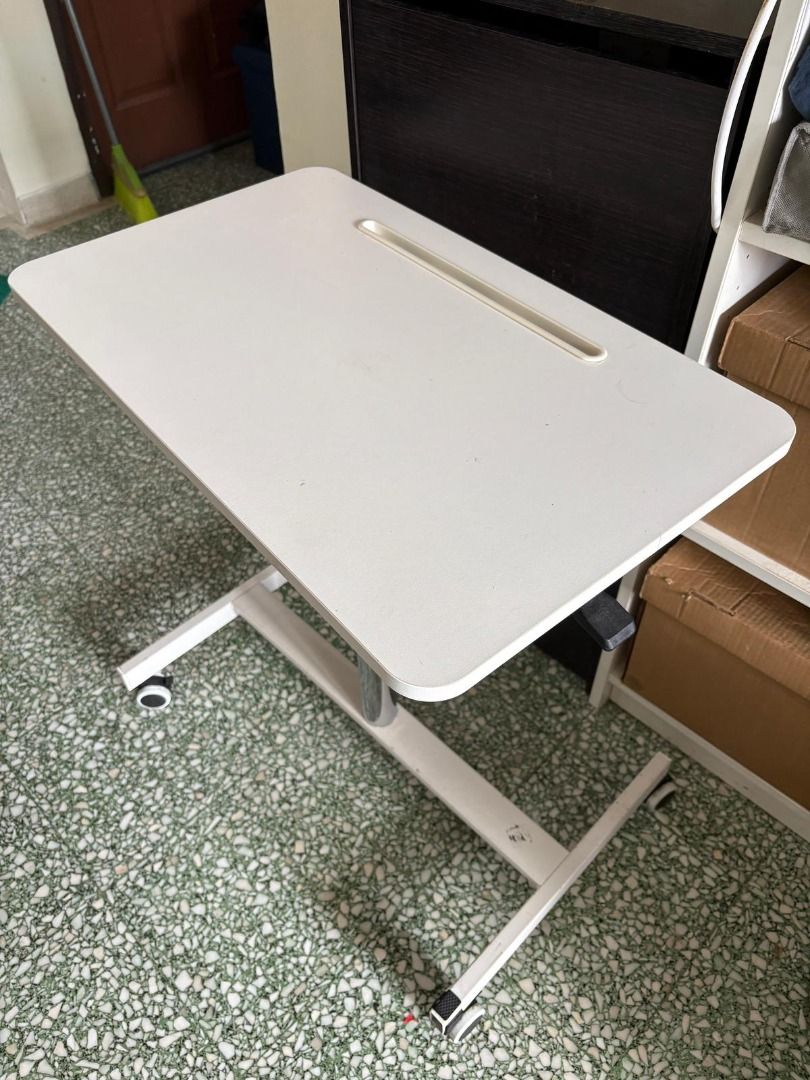Height Adjustable table (Category: Tables & Sets) located in Singapore. Submitted by es3186 (Listing ID 1357653156, Image 1). Description: Clearing-out Size: 660mm x 400mm Height: 700mm to 1100mm Can be dismantle but no box pick-up at blk 47 Circuit Road SG370047.