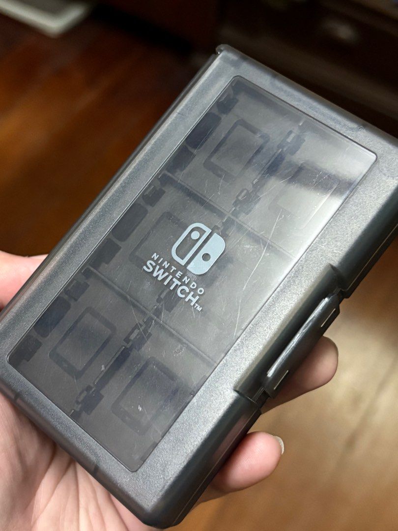 Hori Game Card Case 24 (Black) for Nintendo Switch™ (Category: Nintendo) located in Quezon City. Submitted by keai920905 (Listing ID 1357596488, Image 2). Description: Officially Licensed by Nintendo®. Store & organize up to 24 Nintendo Game Cards with this compact and convenient Game Card Case 24. Easily pop games in and out. Includes memory card holder for memory card storage. Features: • Store & organize up to 24 Nintendo Switch Game Cards • C