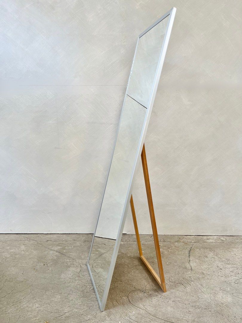 Muji Aluminum Framed Mirror (Category: Mirrors) located in Quezon City. Submitted by statstudioph (Listing ID 1357776447, Image 3). Description: Muji Aluminum Framed Mirror * Php5,800 * LWH, cm: 42 x 1.7 x 151.5 (when folded), 42 x 1.7 x 148 (when deployed), 41 (max width when opened) * used excellent condition, no issues at all * combination of aluminum and pine wood * cleaned and sanitized * pick-up location: Fairview, QC * rfs: redecorating * 
